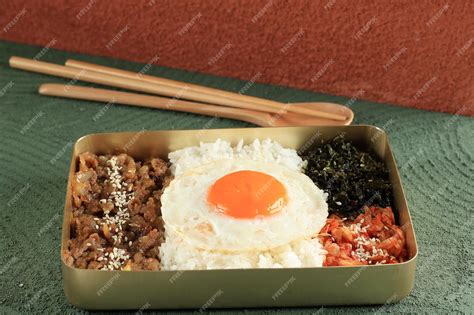 Premium Photo Dosirak Korean Style Packed Meal Or Korean Lunchbox Usually Use Gold Metal Box