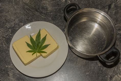 Making of Marijuana Butter with Leafs and Yellow Butter Which Will Be ...