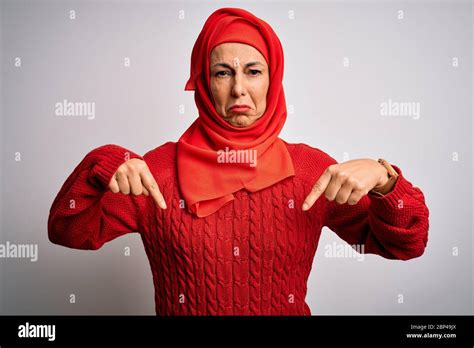 Middle Age Brunette Woman Wearing Muslim Traditional Hijab Over