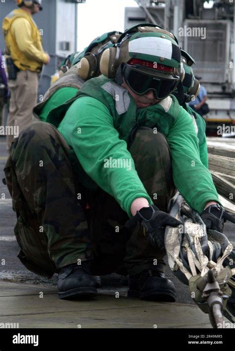 US Navy Sailors Assigned To The Air Department Aboard USS Carl Vinson