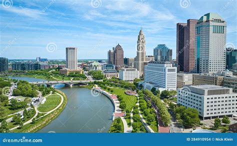 Aerial Scioto River With Promenade And Greenway Visible Beside Downtown