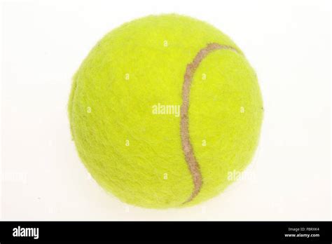 Yellow tennis ball Stock Photo - Alamy