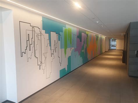 Cityscape Mural Brightens Up Office Passageway Corporate Art Rentals
