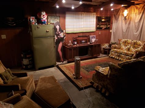 I got rid of the bar stuff and found vintage couches. The 70s vibe is ...