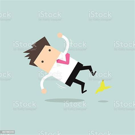 Businessman Slipping On A Banana Peel And Falling Down Stock