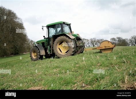 Tractor Rolling Hay Field 6 Stock Photo Alamy
