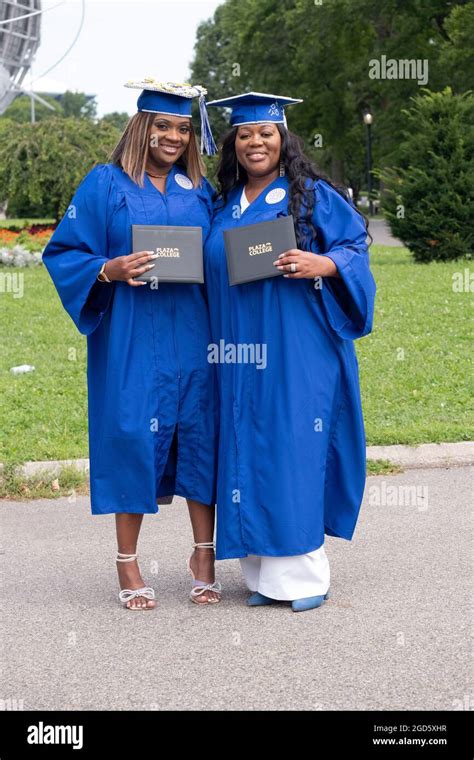 Dark Blue Graduation Cap And Gown