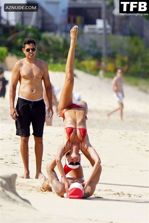 Izabel Goulart Sexy Gets Into The Christmas Spirit Wearing A Tiny Red Bikini At The Beach In St