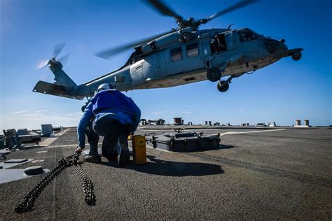 An MH 60S Sea Hawk Helicopter Lands Aboard USS Mitscher D Flickr