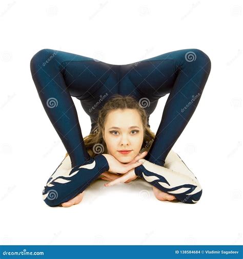 Acrobat Doing Gymnastics A Young Athlete In A White And Blue Suit