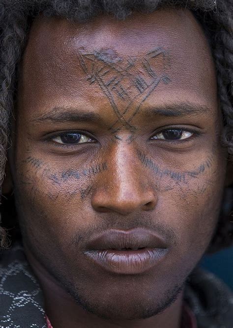 Afar Tribe Man With Curly Hair And Facial Tattoos Assayta Ethiopia