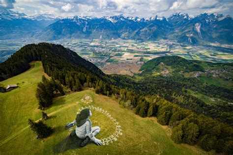 About artist Saype who's painting the Swiss landscape