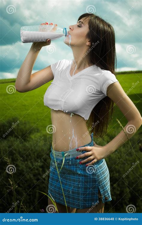 Girl In A T Shirt Drinking Milk Stock Photo Image Of Beauty Nature