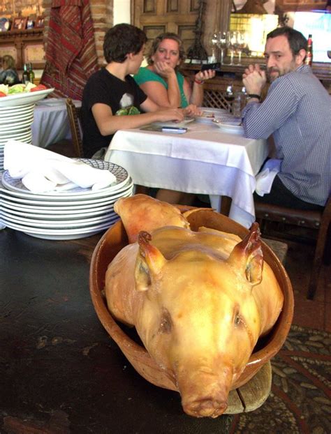 Cochinillo Asado Roast Suckling Pig At The Iconic Mesón De Cándido