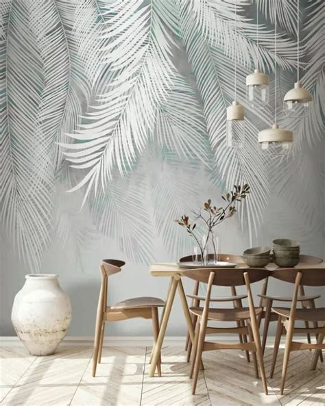 A Dining Room With A Table And Chairs Next To A Plant Wallpapered In