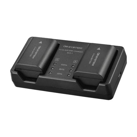 Om System Sbcx 1 Lithium Ion Battery Charger And Battery Set Id