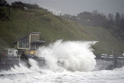 Rescue crews rush to save people from severe flooding as Storm Babet ...