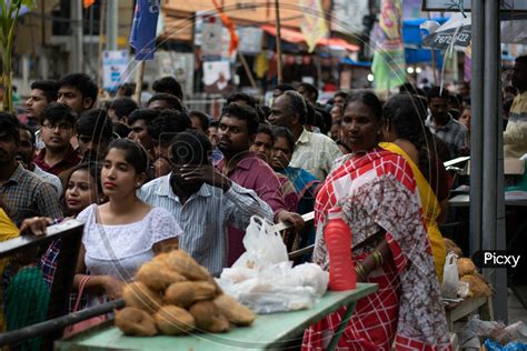 Image Of Devotees In A Queue Line At Khairatabad Ganesha Temple