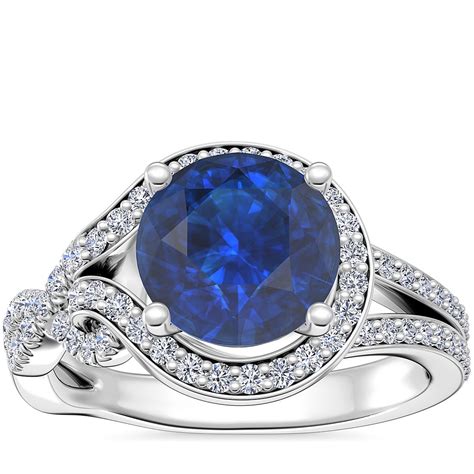 Asymmetrical Diamond Infinity Halo Engagement Ring With Round Sapphire