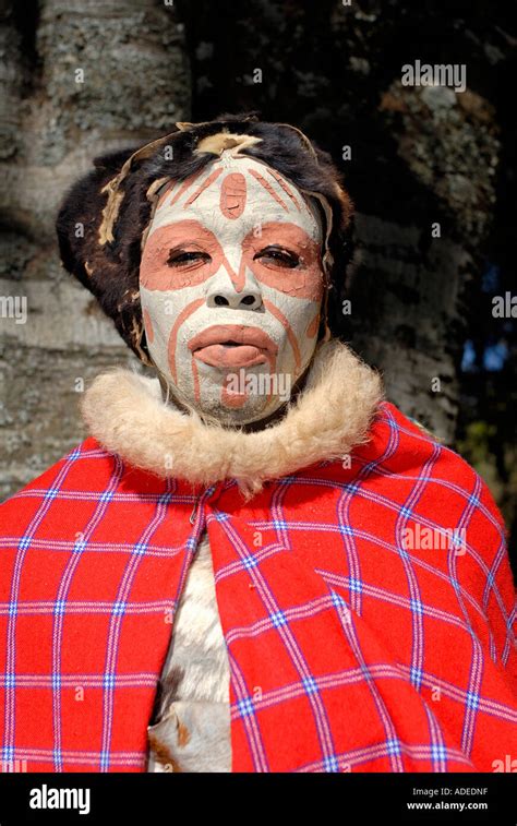 Portrait Of Kikuyu Dancer In Traditional Costume Of Red Blanket And