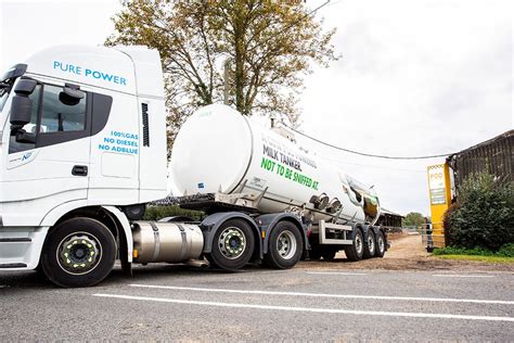 A Milk Truck Pulling Out Of A Dairy