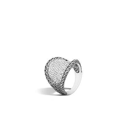 a white gold ring with diamonds on the sides and an openwork design in ...