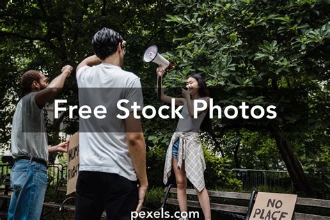 Asian Man Holding Placards Photos Download The Best Free Asian Man