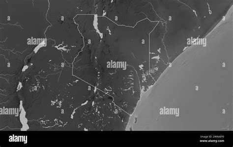 Kenya Outlined On A Grayscale Elevation Map With Lakes And Rivers Stock