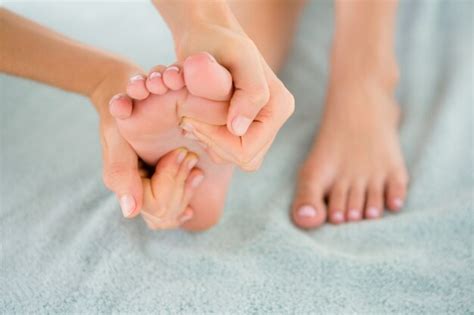 Premium Photo Close Up Of A Woman Receiving Foot Massage