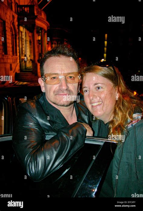 Bono Of U2 Signs Autographs And Poses For Photos With Fans At Dublin