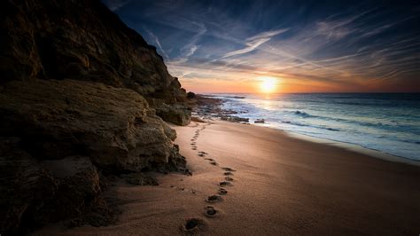 Serene Sunset Footprints Hd Wallpaper Of Nature S Beach Beauty