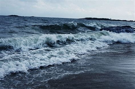 The Waves Are Crashing On The Beach