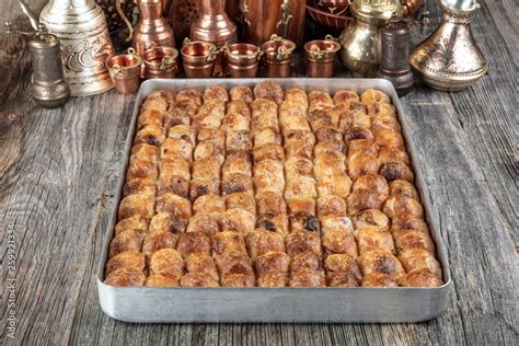 A piece of Bosnian style burek. It is a pastry filled with seasoned ...