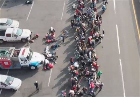 Thousands of Caravan Migrants Request Temporary Asylum in Mexico; Some ...