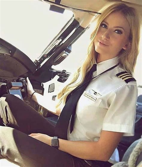 Download Beautiful Blonde Female Pilot Wallpaper | Wallpapers.com