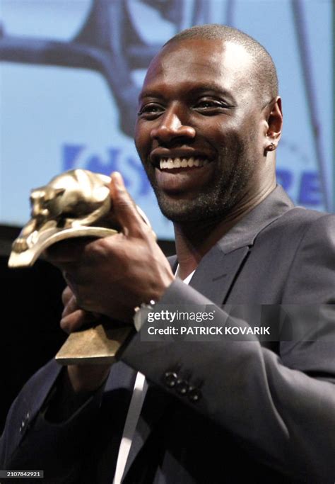 French Actor Omar Sy Presents His Trophy Of The Best Actor For His