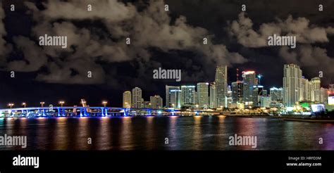 Miami cityscape skyline at dawn sunrise with dark clouds, Florida, USA ...