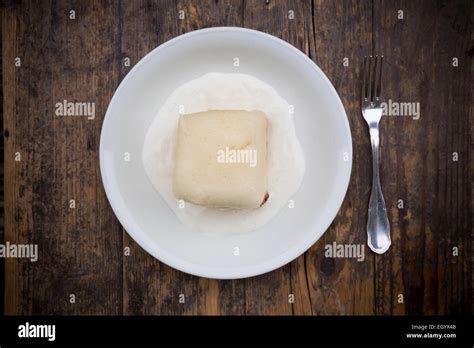 Yeast Dumpling With Vanilla Sauce Stock Photo Alamy