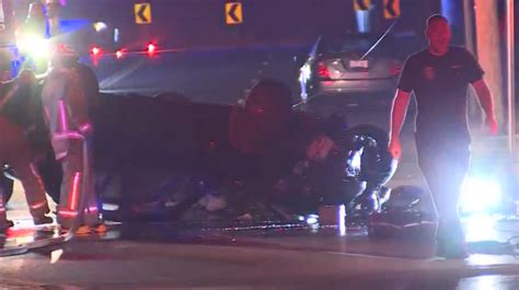 Police Car Crashes Into Utility Pole Overturns In Westwood