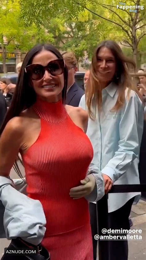 Demi Moore Flaunts Her Sexy Pokies At Milan Fashion Week Aznude