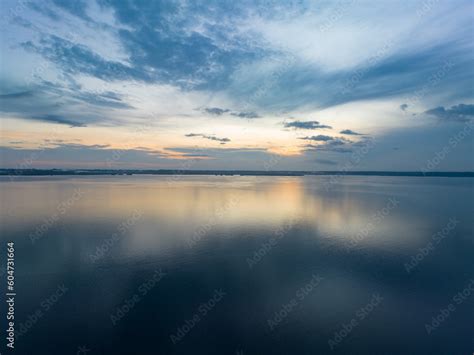 A Tranquil Sunrise Illuminates The Pacific Ocean Not Far From Fak Fak