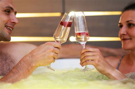 Couple Enjoying Their Time In A Hot Tub Stock Image Image Of Champagne Prosecco