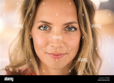 Close Up Portrait Of Blond Woman With Blue Eyes Stock Photo Alamy