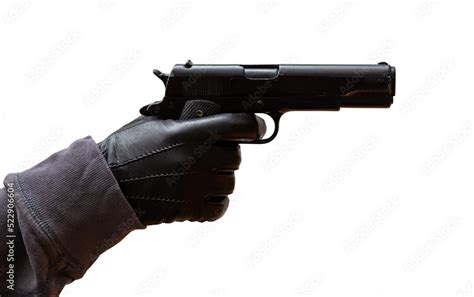 Gloved Hand Holding Gun Black Leather Glove And Pistol Side View