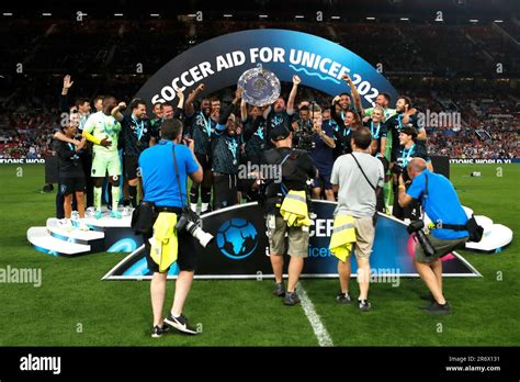 Soccer Aid World Xis Usain Bolt Lifts The Trophy Following Victory In