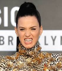 The top five celebrities who wear gold grillz – fashionmommy's Blog