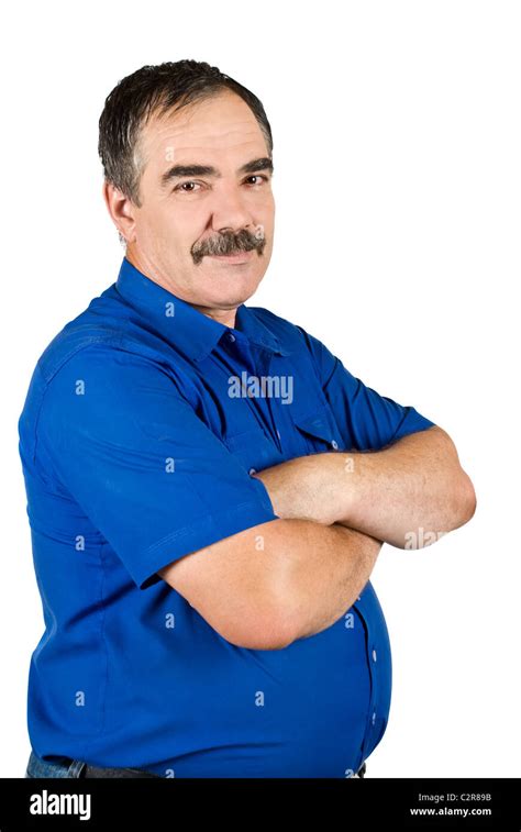 Happy Mature Man Well Dressed Standing With Hands Crossed Smiling And