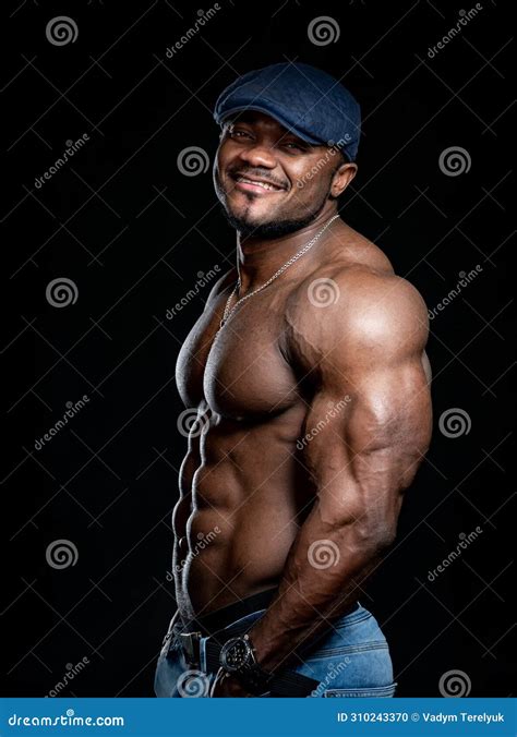 Waist Up Portrait View Of The Muscular Man Standing Pensively With Naked Torso Stock Photo