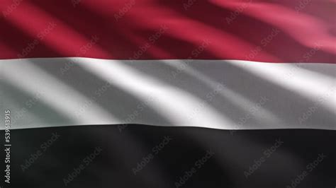 Fluttering The Official Flag Of The Arabian Nation Of Yemen Official