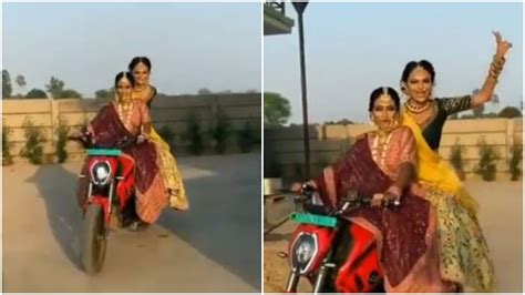 Viral Video Of Bride Entry With Friend On Bike लहंगा पहन दुल्हन को